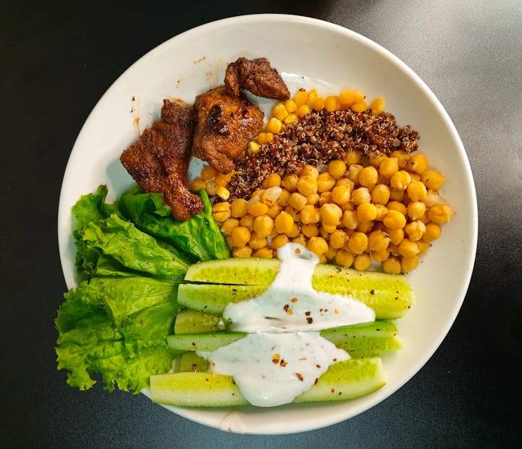 A nutritious bowl with quinoa, chickpeas, and fresh vegetables, perfect for a healthy meal